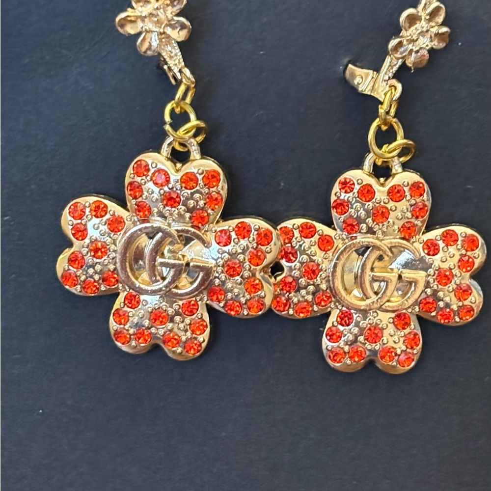 Clover earrings- gold with red rhinestone